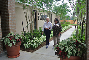 patient and nurse walking outside